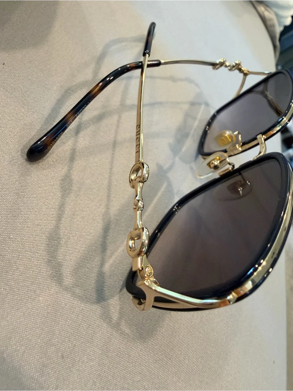 Gucci Black and Gold Oval Sunglasses
